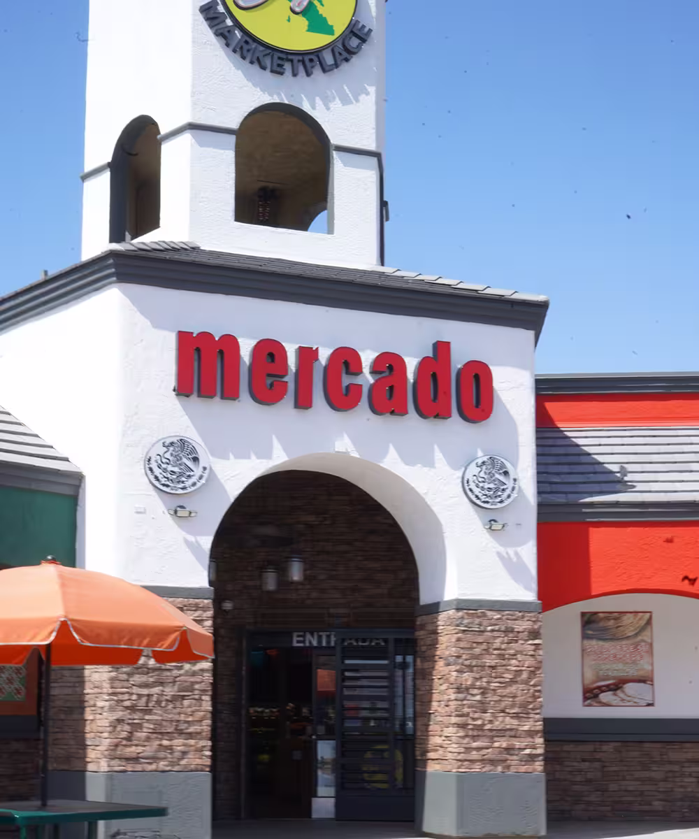 Entrance of Baja Marketplace with signage reading mercado